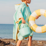 Lightweight kids poncho towel folded compact for travel beach essential Australia