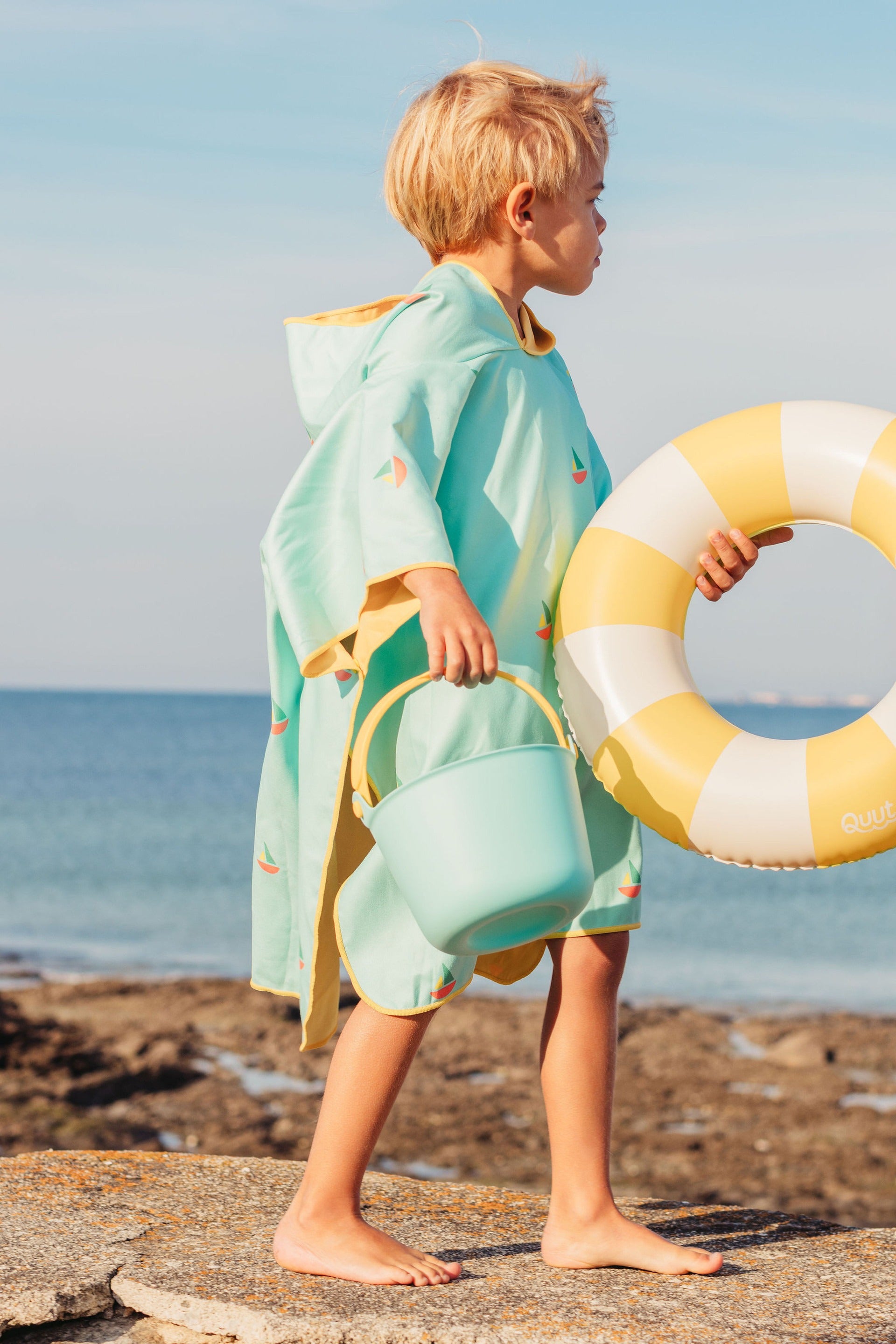 Lightweight kids poncho towel folded compact for travel beach essential Australia
